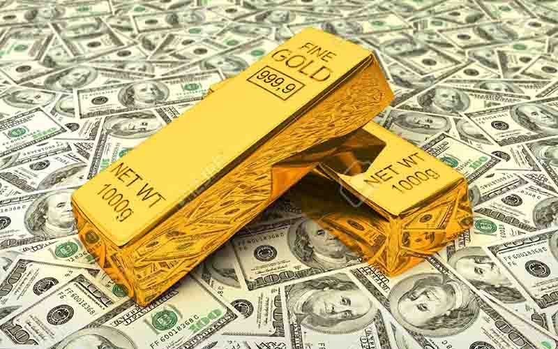 12635681 Invest in gold bank gold bars bullions on dollars Stock Photo