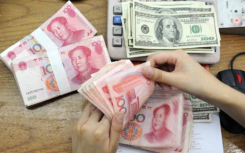 چین باید از نرخ برابری یوآن در برابر دلار دفاع کند