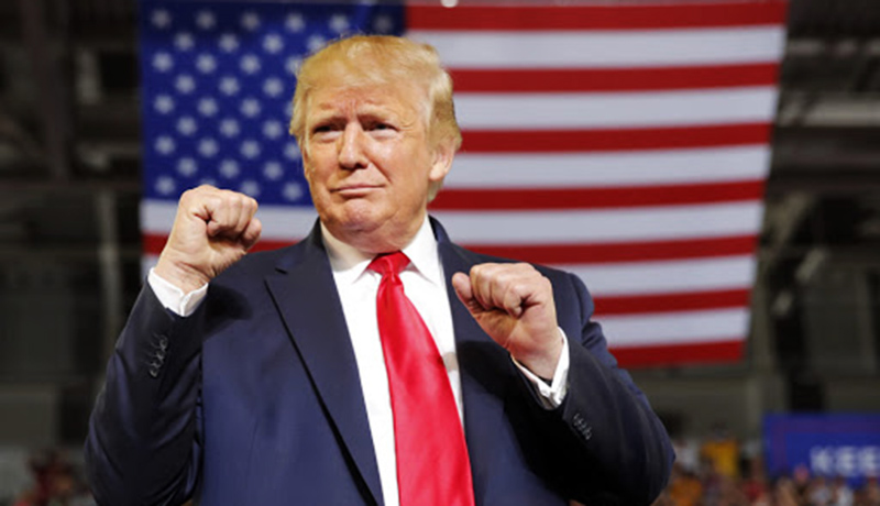 In this July 17, 2019, photo, President Donald Trump arrives to speak at a campaign rally at Williams Arena in Greenville, N.C. (AP Photo/Carolyn Kaster)